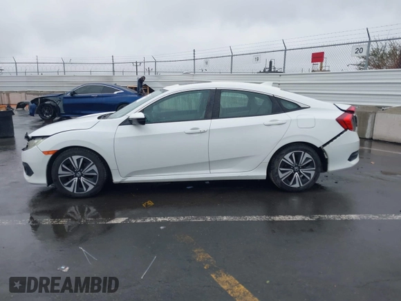 2016 Honda Civic Sedan EX-L with VIN 2HGFC1F78GH648639, listed as a IAAI auction lot 41895039 with 121,072 mi miles. Bid and sale history available at carsss.com. Image 14.