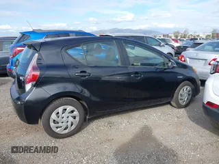 2016 Toyota Prius One z VIN JTDKDTB35G1119947, wystawiony jako IAAI lot #42009815 z przebiegiem 91 941 mil mil oraz . Historia ofert i sprzedaży dostępna na DreamBid. Obrazek 14.