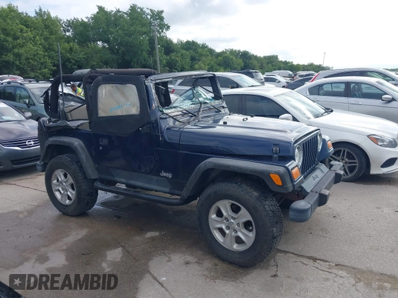 2006 Jeep Wrangler SE with VIN 1J4FA29156P739521, listed as a IAAI auction lot 42563566 with 117,281 mi miles and . Bid and sale history available at DreamBid. Image 13.