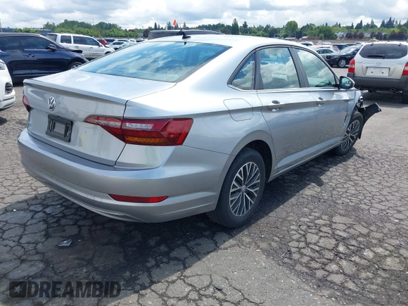 2019 Volkswagen Jetta S with VIN 3VWC57BU2KM215738, listed as a IAAI auction lot 42131376 with 52,720 mi miles and . Bid and sale history available at DreamBid. Image 4.