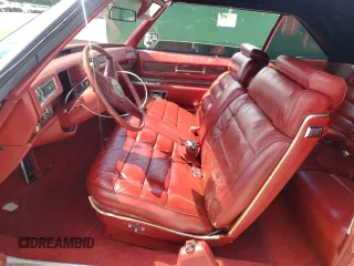 1976 Cadillac Eldorado z VIN 6L67S6Q181256, wystawiony jako Copart lot #56729155 z przebiegiem 51 956 mil mil oraz Szkody całkowita. Historia ofert i sprzedaży dostępna na DreamBid. Obrazek 7.