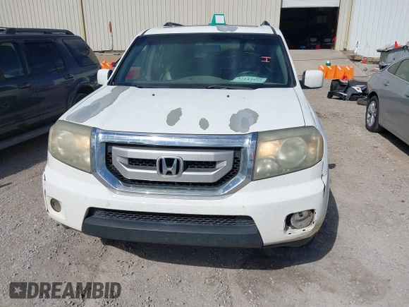 2011 Honda Pilot EX-L with VIN 5FNYF4H56BB037809, listed as a IAAI auction lot 42143553 with 230,873 mi miles. Bid and sale history available at carsss.com. Image 12.