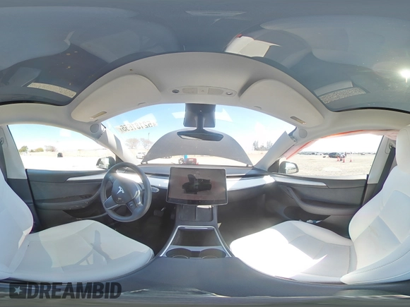 2023 Tesla Model Y Long Range with VIN 7SAYGAEE0PF642810, listed as a Copart auction lot 52181655 with 74,922 mi miles and Salvage Title. Bid and sale history available at DreamBid. Image 12.