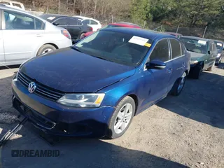 2014 Volkswagen Jetta TDI w/Premium with VIN 3VWLL7AJ8EM432471, listed as a IAAI auction lot 41695764 with 116,083 mi miles and . Bid and sale history available at DreamBid. Image 2.