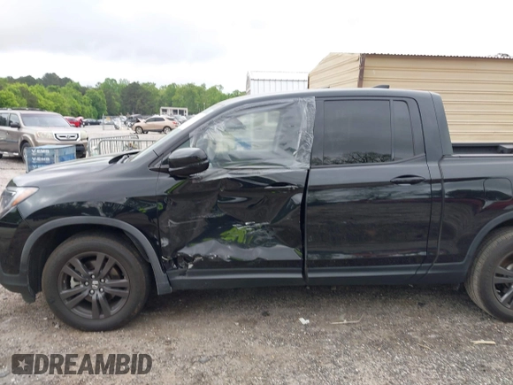 2019 Honda Ridgeline Sport with VIN 5FPYK2F10KB008474, listed as a IAAI auction lot 42144225 with 101,274 mi miles and . Bid and sale history available at DreamBid. Image 6.