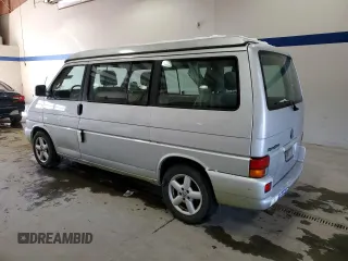 2003 Volkswagen EuroVan MV с VIN WV2NB47073H001005, выставлен на аукционе Copart как лот 87284844 с пробегом 283 979 миль миль и Чистый • Clean title. История ставок и продаж доступна на DreamBid. Изображение 2.