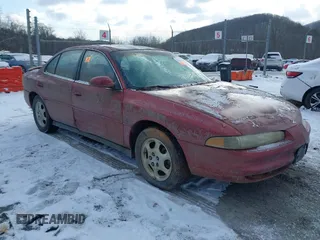 1999 Oldsmobile Intrigue GL z VIN 1G3WS52KXXF335273, wystawiony jako IAAI lot #41624543 z przebiegiem 106 606 mil mil oraz . Historia ofert i sprzedaży dostępna na DreamBid. Obrazek 1.