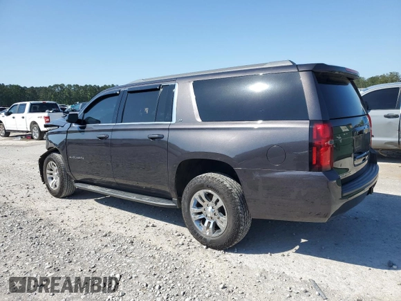 2017 Chevrolet Suburban LT z VIN 1GNSCHKC5HR329037, wystawiony jako Copart lot #52016315 z przebiegiem 215 859 mil mil oraz Szkoda całkowita • Salvage title. Historia ofert i sprzedaży dostępna na DreamBid. Obrazek 2.