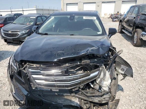 2017 Cadillac XT5 Premium Luxury AWD with VIN 1GYKNERS7HZ230664, listed as a Copart auction lot 70608044 with 70,806 mi miles and Salvage Title. Bid and sale history available at carsss.com. Image 5.