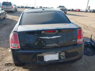 2014 Chrysler 300 with VIN 2C3CCAGT6EH209437, listed as a IAAI auction lot 41780106 with 153,414 mi miles. Bid and sale history available at carsss.com. Image 20.