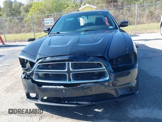 2013 Dodge Charger SE with VIN 2C3CDXBG5DH639694, listed as a IAAI auction lot 41134402 with 159,517 mi miles and . Bid and sale history available at DreamBid. Image 13.