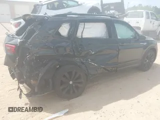 2021 Volkswagen Tiguan SE z VIN 3VV3B7AX5MM027369, wystawiony jako IAAI lot #42082821 z przebiegiem 74 024 mil mil oraz . Historia ofert i sprzedaży dostępna na DreamBid. Obrazek 17.