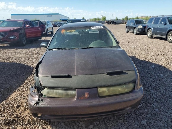 1999 Saturn SL with VIN 1G8ZK527XXZ136922, listed as a Copart auction lot 86704404 with 134,897 mi miles and Salvage Title. Bid and sale history available at carsss.com. Image 5.