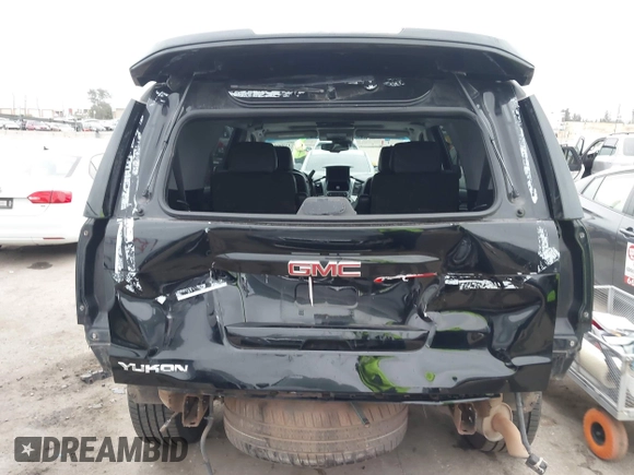 2015 GMC Yukon SLT with VIN 1GKS1BKC3FR129173, listed as a IAAI auction lot 41795585 with 97,893 mi miles. Bid and sale history available at carsss.com. Image 17.