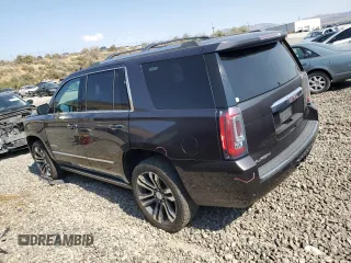2018 GMC Yukon Denali with VIN 1GKS2CKJXJR217857, listed as a Copart auction lot 62943934 with 122,015 mi miles and Salvage Title. Bid and sale history available at carsss.com. Image 2.