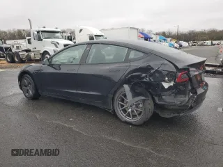 2021 Tesla Model 3 Standard Range Plus with VIN 5YJ3E1EA2MF087879, listed as a Copart auction lot 51853235 with 65,477 mi miles and Non Repairable. Bid and sale history available at carsss.com. Image 2.