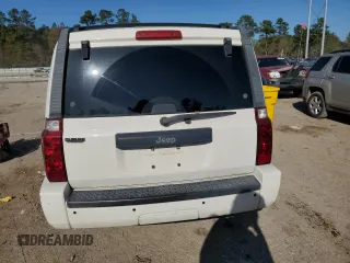 2010 Jeep Commander Sport with VIN 1J4RH4GK9AC113888, listed as a Copart auction lot 84553544 with 208,109 mi miles and Salvage title. Bid and sale history available at DreamBid. Image 6.