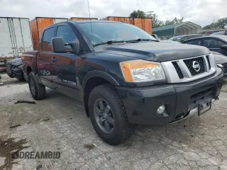 2015 Nissan Titan Pro-4X with VIN 1N6BA0EC1FN507894, listed as a Copart auction lot 65784274 with 147,576 mi miles and Salvage title. Bid and sale history available at DreamBid. Image 4.