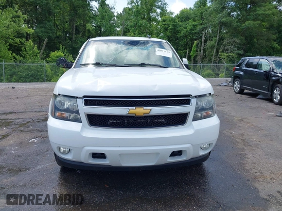 2012 Chevrolet Tahoe LT z VIN 1GNSCBE00CR176056, wystawiony jako IAAI lot #42091159 z przebiegiem 216 650 mil mil oraz . Historia ofert i sprzedaży dostępna na DreamBid. Obrazek 13.
