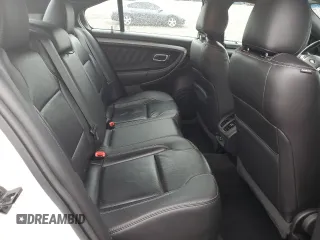 2016 Ford Taurus SEL z VIN 1FAHP2E87GG146931, wystawiony jako Copart lot #56135655 z przebiegiem 99 733 mil mil oraz Szkoda całkowita • Salvage title. Historia ofert i sprzedaży dostępna na DreamBid. Obrazek 10.