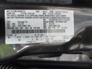 2015 Ford C-Max Energi SEL with VIN 1FADP5CU7FL121209, listed as a IAAI auction lot 41621034 with 145,648 mi miles. Bid and sale history available at carsss.com. Image 9.