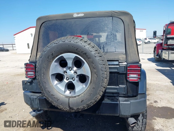 2016 Jeep Wrangler Sahara with VIN 1C4AJWBG0GL174481, listed as a IAAI auction lot 41868149 with 59,300 mi miles and . Bid and sale history available at DreamBid. Image 16.