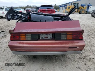 1987 Chevrolet Camaro z VIN 1G1FP21H2HN131699, wystawiony jako Copart lot #87860445 z przebiegiem 86 117 mil mil oraz Szkoda całkowita • Salvage title. Historia ofert i sprzedaży dostępna na DreamBid. Obrazek 6.