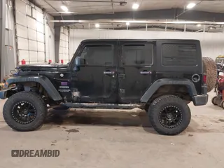 2017 Jeep Wrangler Unlimited Sport with VIN 1C4BJWDGXHL698014, listed as a IAAI auction lot 41384325 with 121,402 mi miles. Bid and sale history available at carsss.com. Image 15.