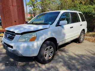 2004 Honda Pilot EX with VIN 2HKYF18404H549771, listed as a IAAI auction lot 41710359 with Not Provided miles and . Bid and sale history available at carsss.com. Image 1.