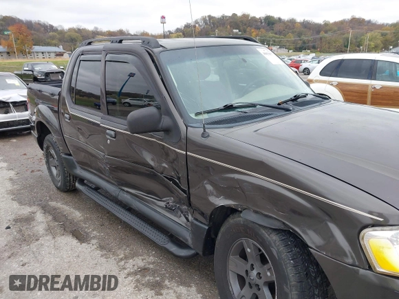 2005 Ford Explorer Sport Trac XLS z VIN 1FMZU77K05UB13891, wystawiony jako IAAI lot #40859877 z przebiegiem 157 308 mil mil oraz . Historia ofert i sprzedaży dostępna na DreamBid. Obrazek 6.