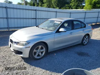 2015 BMW 3 Series 320i xDrive with VIN WBA3C3C53FK200703, listed as a Copart auction lot 58407245 with 144,343 mi miles and Clean title. Bid and sale history available at DreamBid. Image 1.