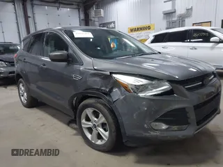 2014 Ford Escape SE z VIN 1FMCU9GX0EUA45461, wystawiony jako IAAI lot #42046417 z przebiegiem 102 351 mil mil oraz . Historia ofert i sprzedaży dostępna na DreamBid. Obrazek 1.
