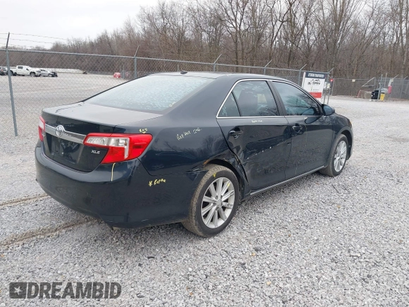 2014 Toyota Camry SE with VIN 4T1BK1FK7EU548333, listed as a IAAI auction lot 41598278 with 119,534 mi miles. Bid and sale history available at carsss.com. Image 4.