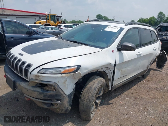 2017 Jeep Cherokee Trailhawk with VIN 1C4PJMBSXHW657446, listed as a IAAI auction lot 42406437 with 158,351 mi miles and . Bid and sale history available at DreamBid. Image 18.