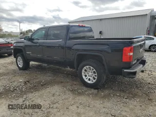 2016 GMC Sierra 1500 with VIN 3GTU2MEH6GG200680, listed as a Copart auction lot 82417134 with 121,912 mi miles and Salvage Title. Bid and sale history available at DreamBid. Image 2.