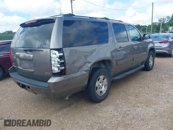 2011 Chevrolet Suburban LT with VIN 1GNSKJE37BR337895, listed as a IAAI auction lot 42171238 with 228,327 mi miles and . Bid and sale history available at DreamBid. Image 4.