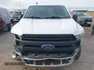 2020 Ford F-150 XL with VIN 1FTEW1CB7LKF25864, listed as a IAAI auction lot 42145041 with 116,651 mi miles and . Bid and sale history available at DreamBid. Image 13.