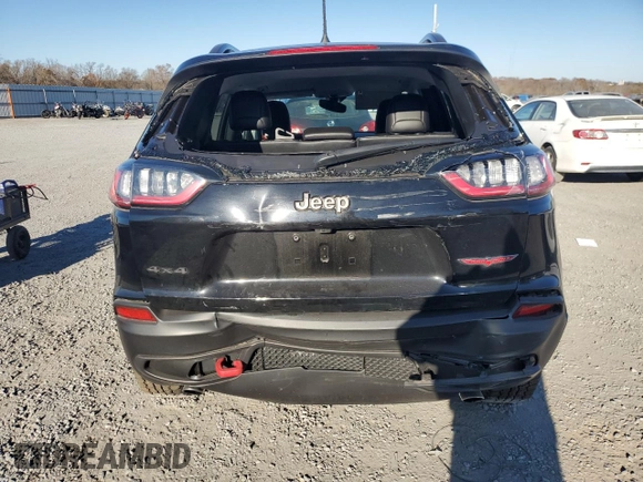 2022 Jeep Cherokee Trailhawk with VIN 1C4PJMBX5ND549237, listed as a Copart auction lot 83760264 with 24,756 mi miles and Salvage Title. Bid and sale history available at carsss.com. Image 6.