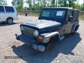 2005 Jeep Wrangler Unlimited with VIN 1J4FA44S25P385421, listed as a IAAI auction lot 42039381 with 1 mi miles. Bid and sale history available at carsss.com. Image 2.