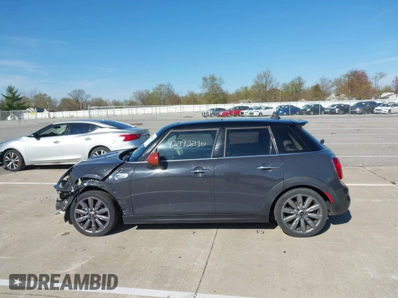 2015 MINI Hardtop 4 Door S with VIN WMWXU3C57FT892179, listed as a IAAI auction lot 42092010 with 95,156 mi miles and . Bid and sale history available at DreamBid. Image 15.