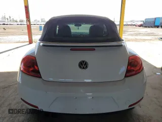 2013 Volkswagen Beetle 2.5L with VIN 3VW5P7AT2DM811768, listed as a Copart auction lot 54609125 with 60,505 mi miles and Salvage Title. Bid and sale history available at DreamBid. Image 6.