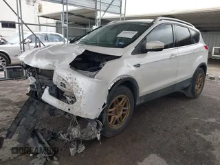 2015 Ford Escape Titanium z VIN 1FMCU0J91FUA27610, wystawiony jako IAAI lot #42095995 z przebiegiem 122 521 mil mil oraz . Historia ofert i sprzedaży dostępna na DreamBid. Obrazek 18.