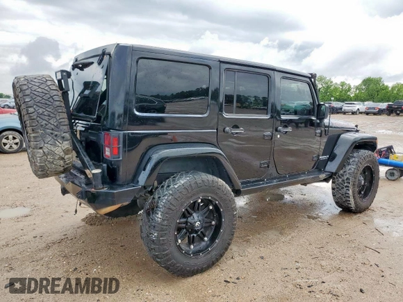 2015 Jeep Wrangler Unlimited Rubicon Hard Rock with VIN 1C4HJWFG1FL710264, listed as a Copart auction lot 54123285 with 96,737 mi miles and Salvage title. Bid and sale history available at DreamBid. Image 3.
