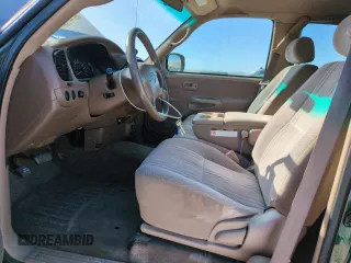 2000 Toyota Tundra SR5 with VIN 5TBBT4417YS114749, listed as a Copart auction lot 52582605 with 158,155 mi miles and Salvage Title. Bid and sale history available at DreamBid. Image 7.