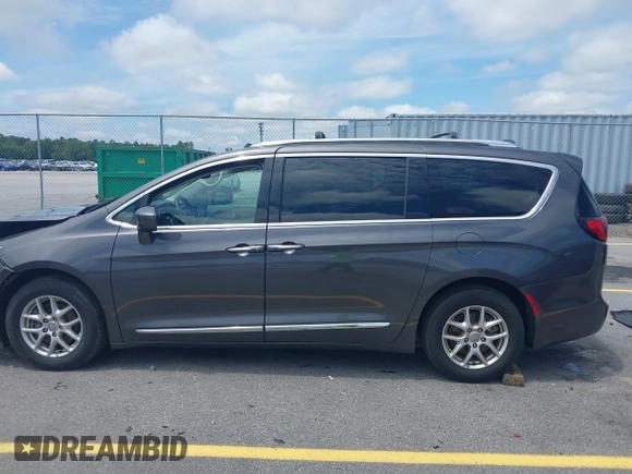 2020 Chrysler Pacifica Touring L with VIN 2C4RC1BG1LR269004, listed as a IAAI auction lot 42287228 with 71,498 mi miles and . Bid and sale history available at DreamBid. Image 14.