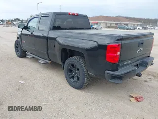 2015 Chevrolet Silverado 1500 LT with VIN 1GCVKREC2FZ427076, listed as a IAAI auction lot 42128553 with 109,776 mi miles and . Bid and sale history available at DreamBid. Image 3.