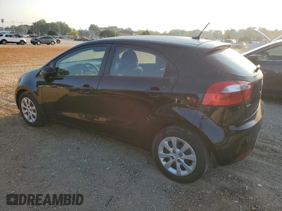 2014 Kia Rio EX with VIN KNADN5A34E6325423, listed as a Copart auction lot 69116324 with 104,083 mi miles and Salvage Title. Bid and sale history available at carsss.com. Image 2.