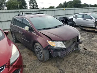 2014 Honda Odyssey Touring with VIN 5FNRL5H95EB067703, listed as a Copart auction lot 71066034 with Not Provided miles and Salvage Title. Bid and sale history available at carsss.com. Image 1.