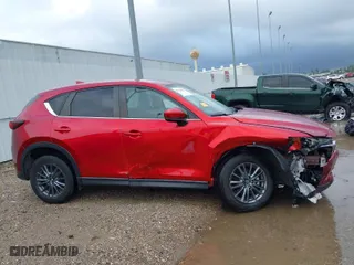 2021 Mazda CX-5 Touring with VIN JM3KFACM4M0382834, listed as a IAAI auction lot 41716817 with 28,894 mi miles. Bid and sale history available at carsss.com. Image 13.