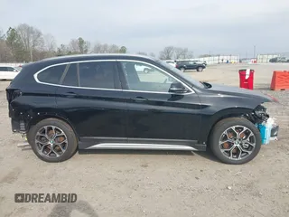 2021 BMW X1 xDrive28i with VIN WBXJG9C05M5T83784, listed as a IAAI auction lot 41696073 with 15,865 mi miles and . Bid and sale history available at DreamBid. Image 14.
